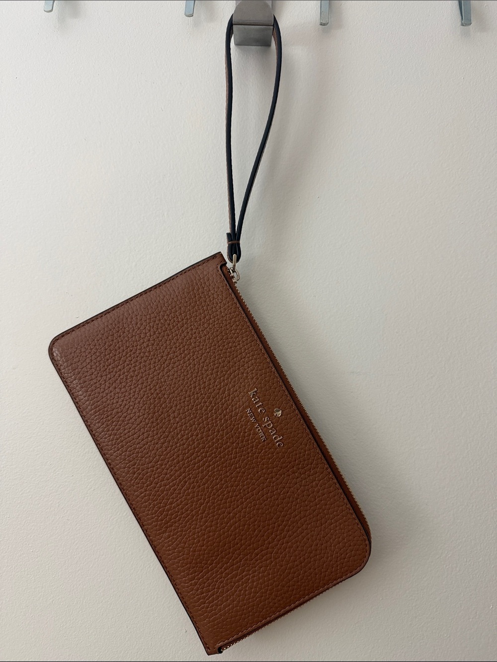 kate spade Pebbled Leather Wristlet with Strap in Warm Gingerbread